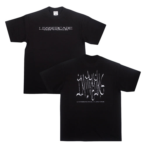 Front and back view of a black I’M TRYING (Single Release) Shirt; the front features white Lesser Care text, and the back displays large, distressed white I’m Trying text above smaller, illegible white text.
